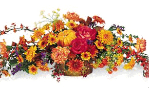 fall arrangement filled with flowers such as fall mums, alstroemeria, and yellow 	aster